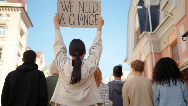 Group of students holding signs in protest