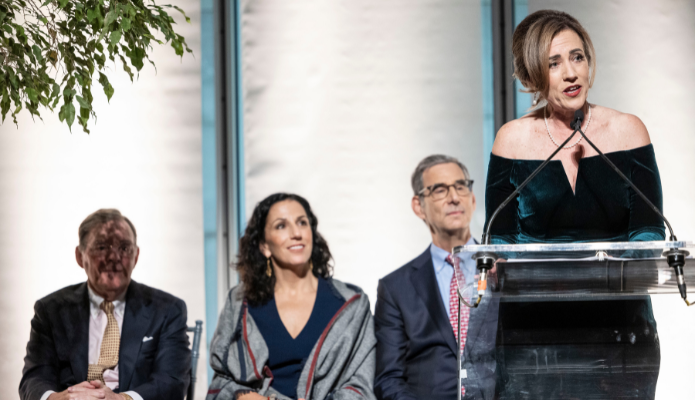Photo of Dr. Duardo speaking at the podium during the award ceremony
