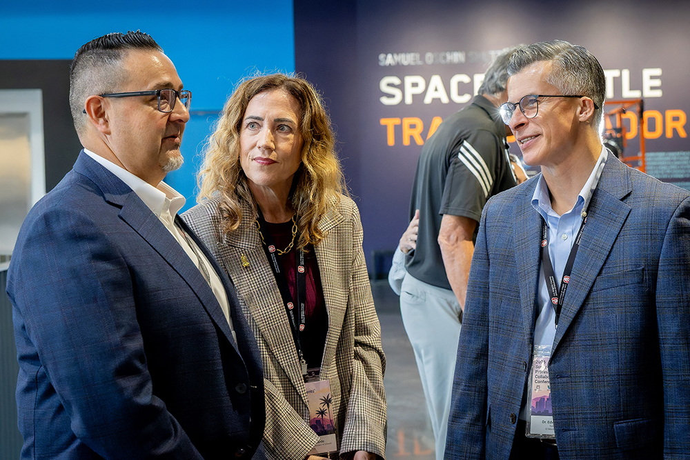 Guests speaking with Dr. Debra Duardo at the 2026 Superintendents' Professional Collaborative Conference