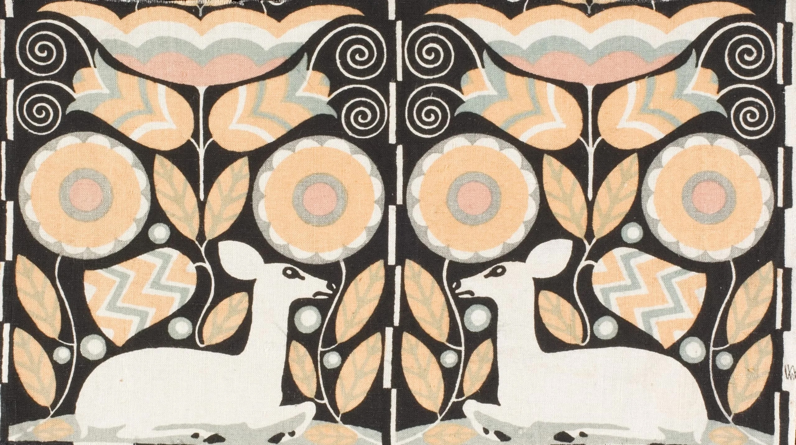 Textile Fragment depicting two deer looking at each other with flowers and leaves creating a symmetric pattern