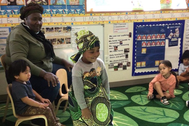 Teacher working with a group of students in a classroom