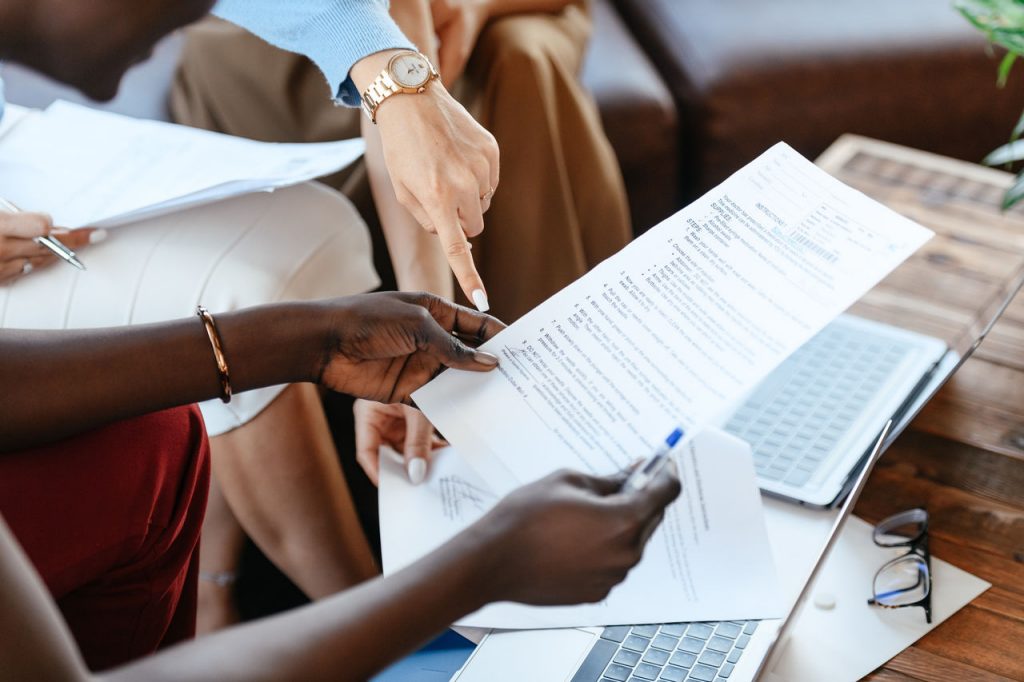 Colleagues reviewing a document