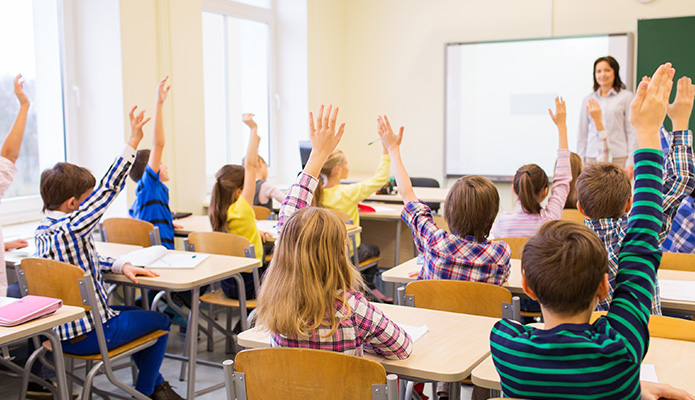 kids raising hands