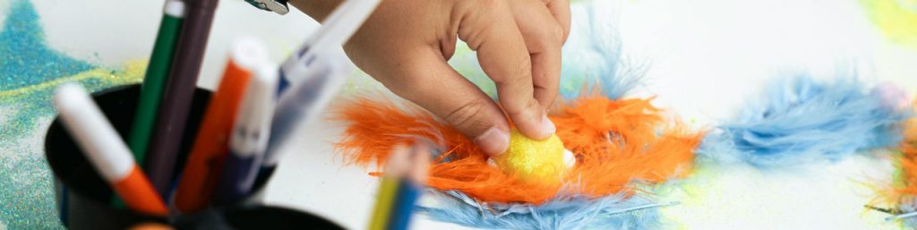 Student creating visual art piece