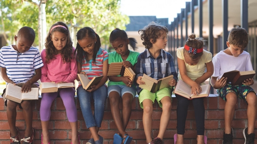 photo of kids reading books