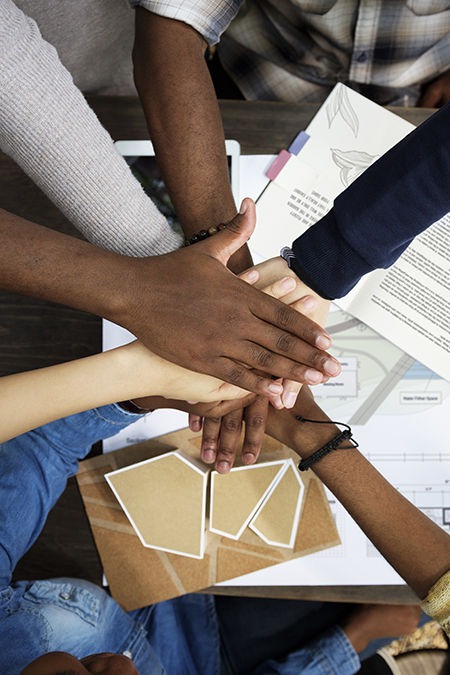 Hands-in huddle