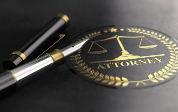 image of pen next to attorney seal